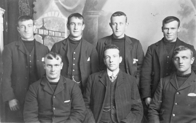 Group portrait of seven men, Yarmouth, 1909