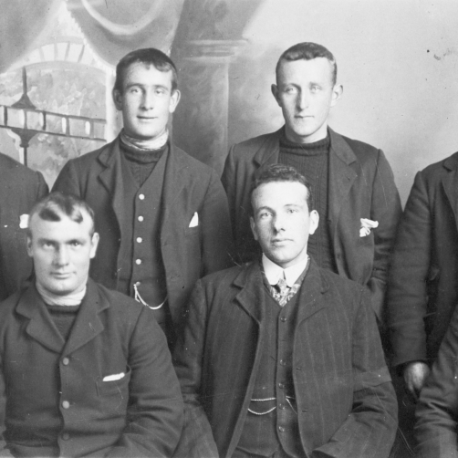 Group portrait of seven men, Yarmouth, 1909