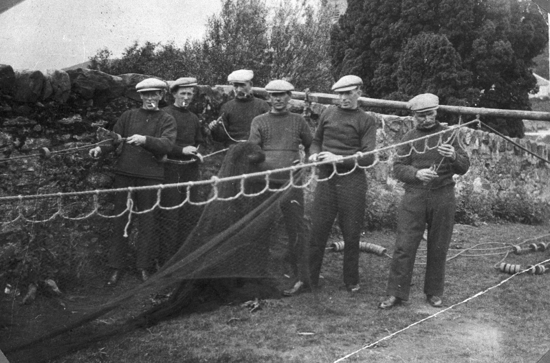Portrait of six fishermen setting up a ringnet, Tarbert