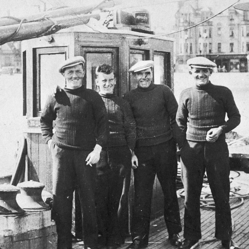Portrait of Four Men Onboard 'Mystical Rose', CN245, Campbeltown, c.1937.