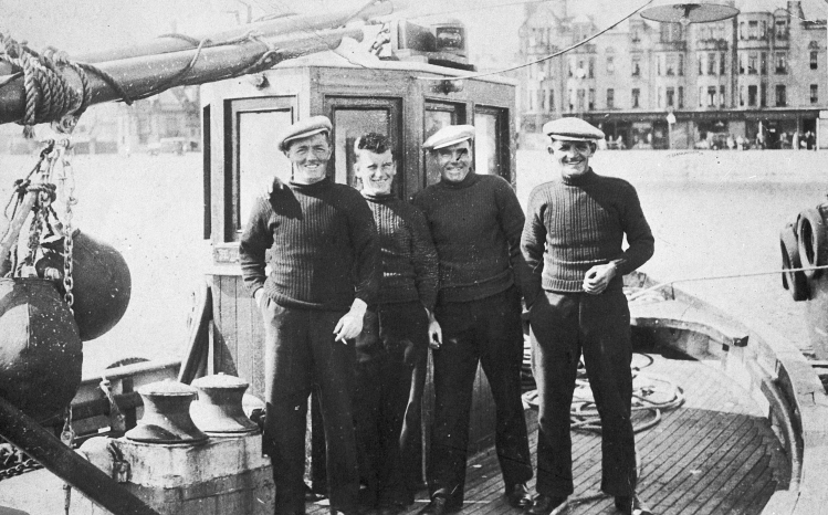 Portrait of Four Men Onboard 'Mystical Rose', CN245, Campbeltown, c.1937.