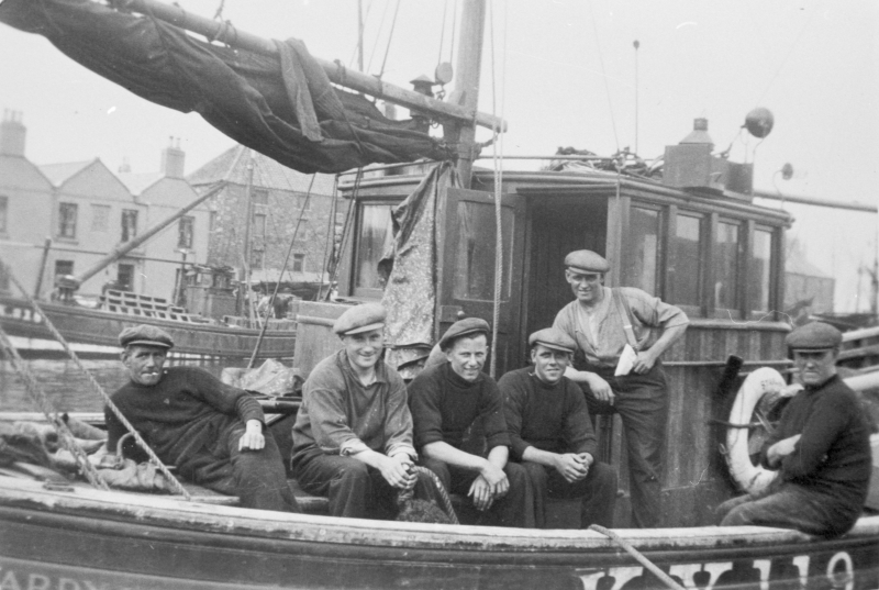 Crew on board 'Star of Hope', KY119. Taken at Eyemouth, 1939. L-R: Peter Boyter, David W. Allan, J. Stevenson, Tom Costorphine, David Costorphine, and Jock Brown. Skipper Tom Ovenstone is not present.