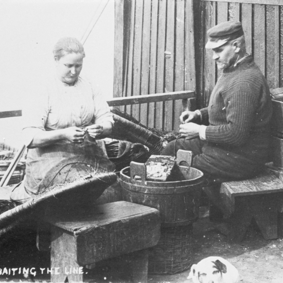 Portrait of George West and his wife baiting lines.